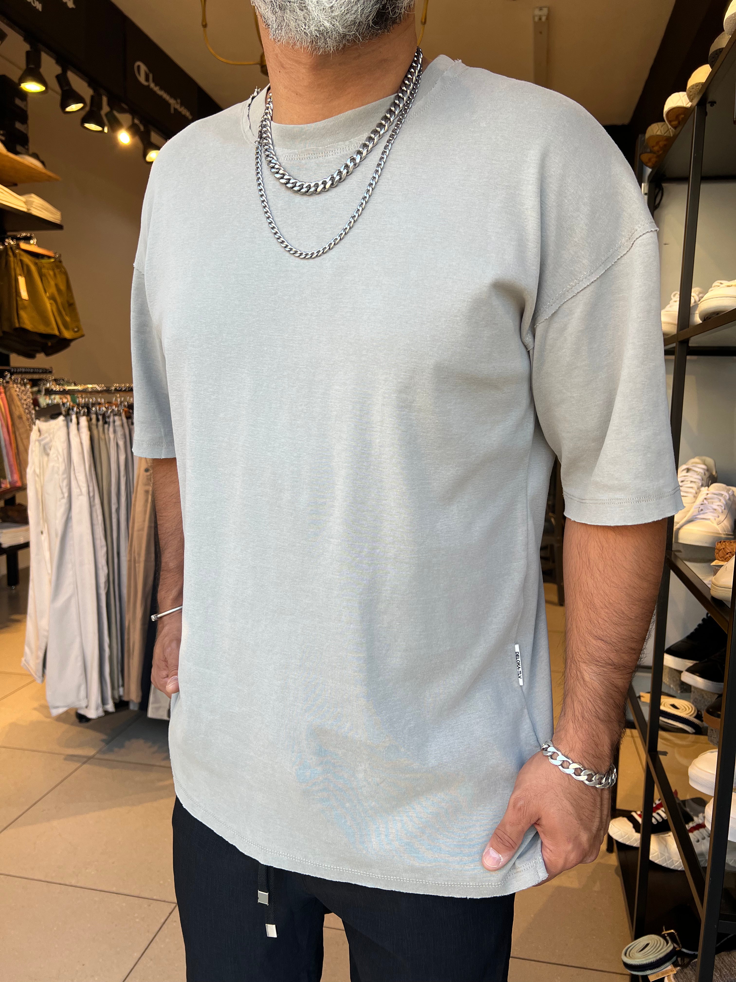 דה לוקה - חולצה אוברסייז בצבע אפור בהיר 707101