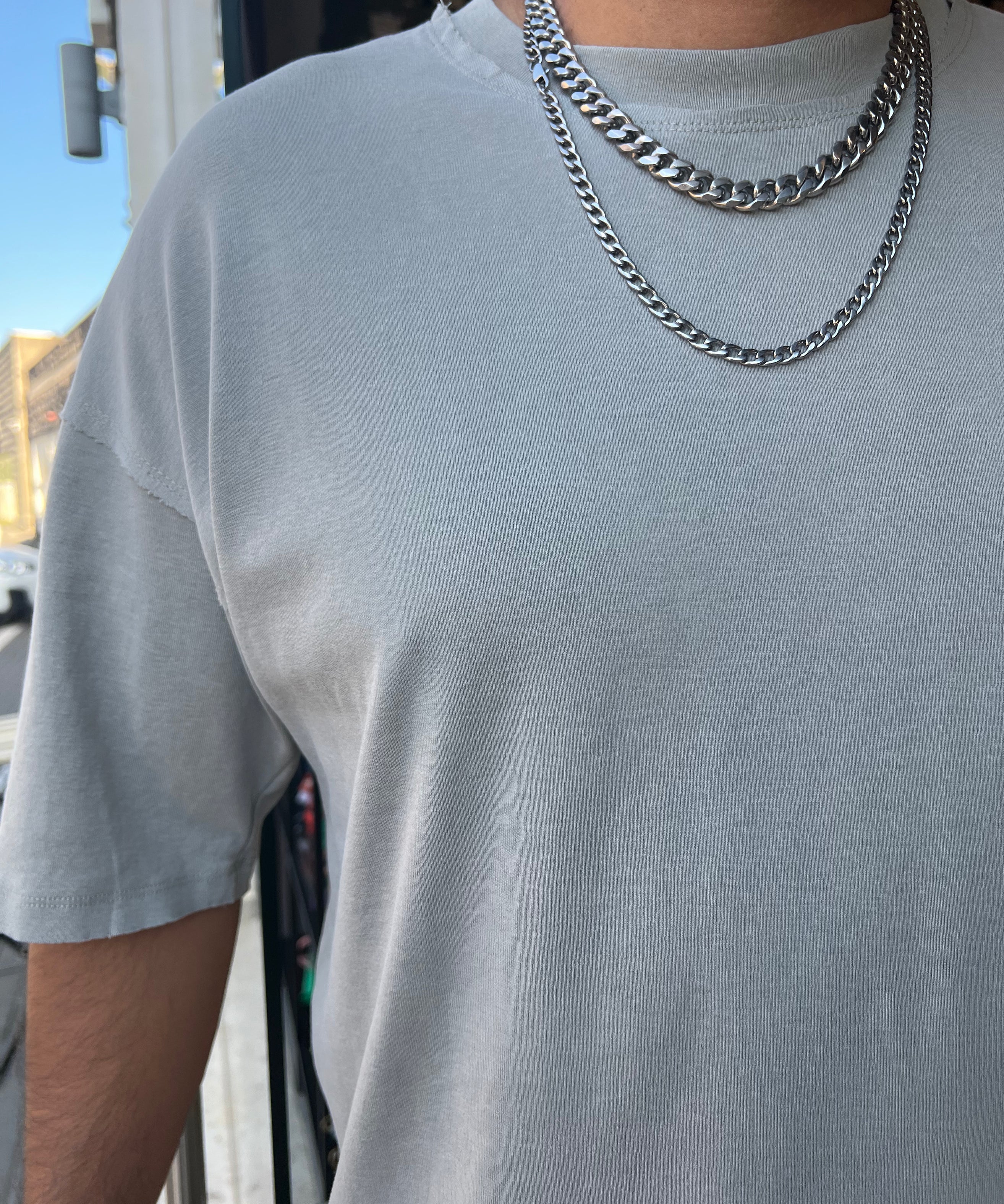 דה לוקה - חולצה אוברסייז בצבע אפור בהיר 707101